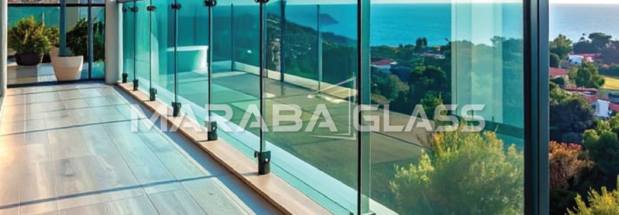 Frameless laminated tempered glass balcony balustrade installed by Maraba Glass & Aluminum Systems Ltd.