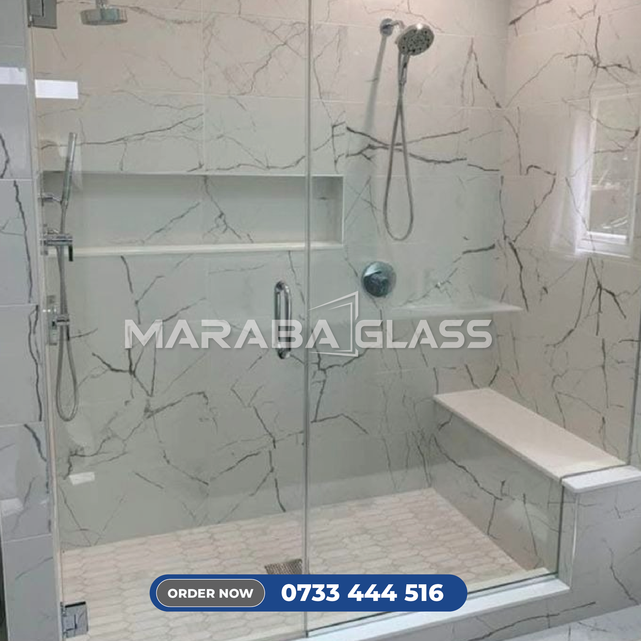 Modern frameless shower cubicle with 8mm tempered safety glass installed by Maraba Glass & Aluminum Systems Ltd.
