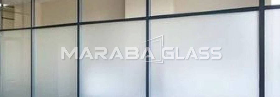 Comparison of clear, frosted, and tinted glass office partitions in Kenya.