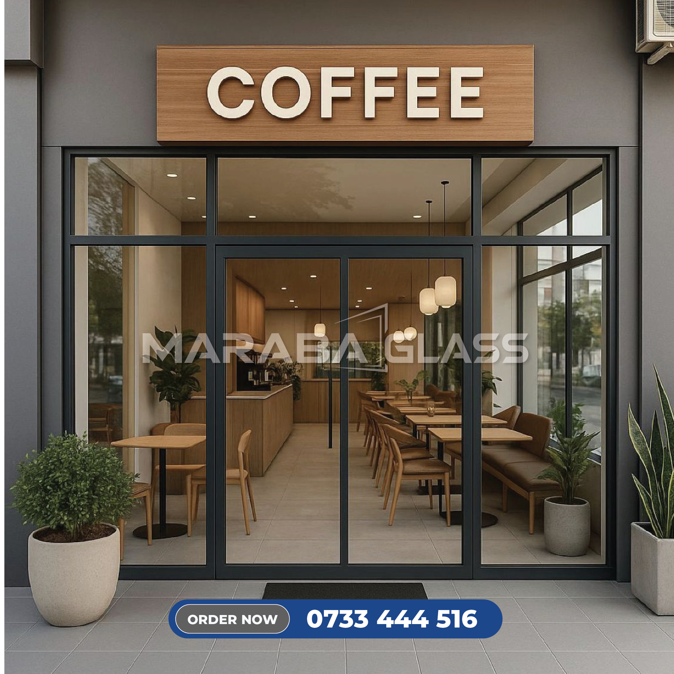 Modern frameless glass shopfront installed by Maraba Glass & Aluminum Systems Ltd in Kenya.