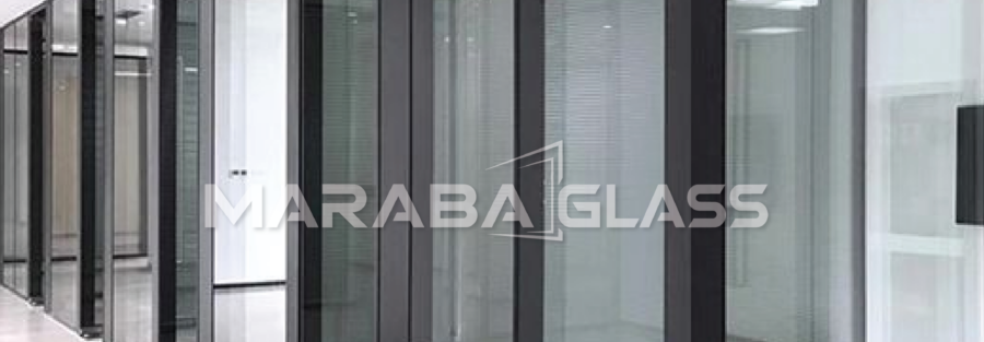 Modern office renovated with frameless office glass partitions by Maraba Glass & Aluminum Systems Ltd.